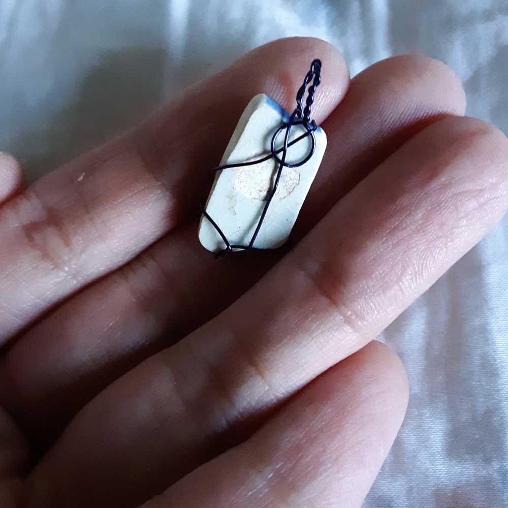 Handmade river pottery pendant